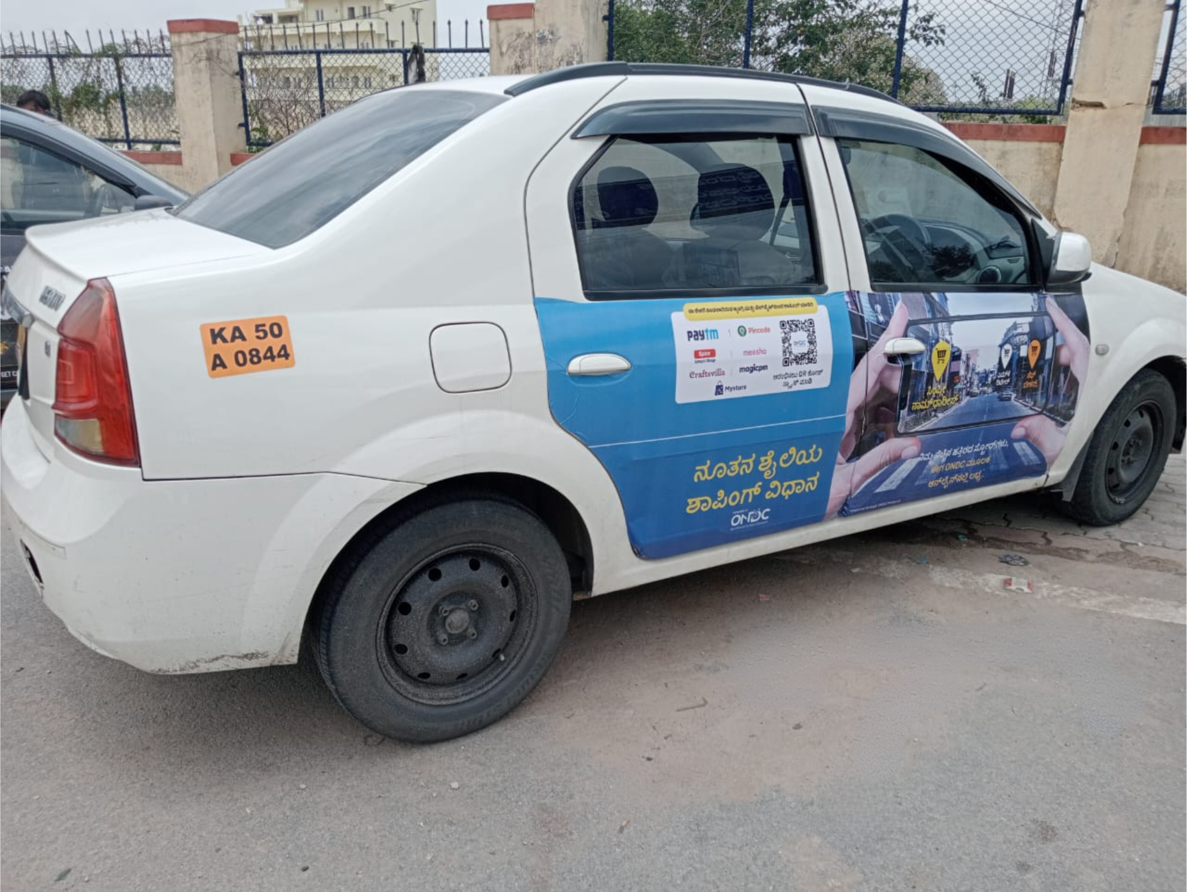 4-door car wrap advertising campaign by ONDC x Wrap2Earn