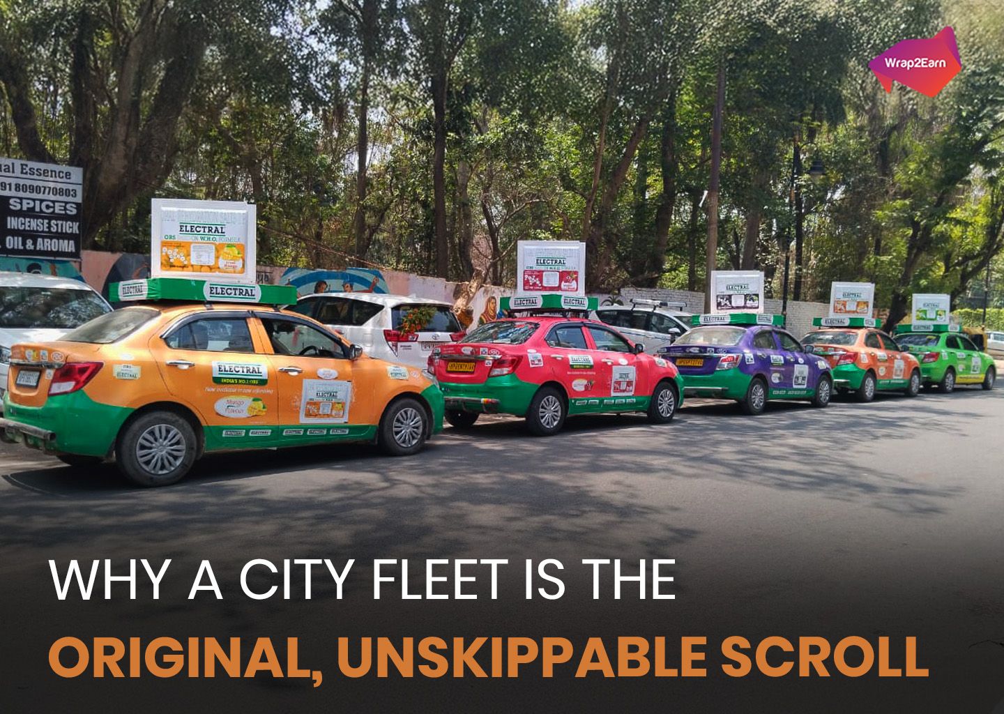 Taxis with different wraps representing data-driven ad placement.