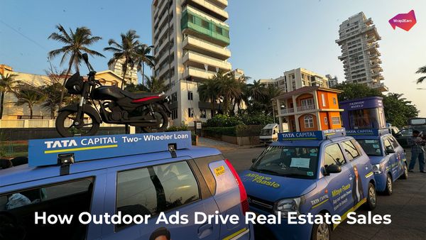 Real estate ads on cabs and billboards in the city, boosting visibility with Wrap2Earn