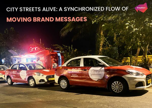 A fleet of branded cabs and buses creating a moving visual wave across the city streets, by Wrap2Earn.