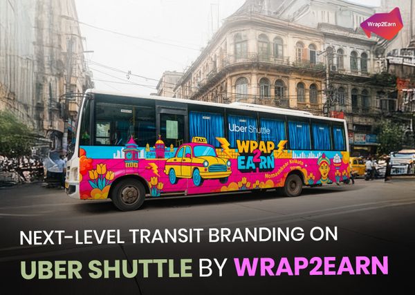 Wrap2Earn x Uber Shuttle branded buses on busy roads showcasing transit advertising in motion.