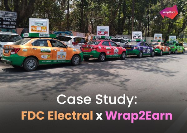 FDC Electral branded Carnival Cab solution by Wrap2Earn driving through city streets.