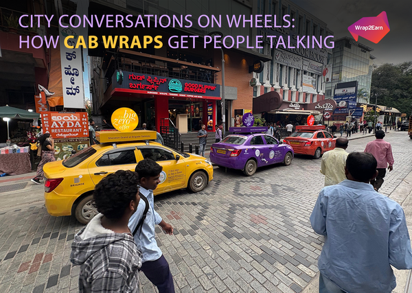 Commuters noticing vibrant cab ads by Wrap2Earn that spark conversations and boost brand visibility on city streets.