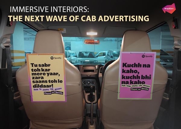 Immersive taxi interior ad by Wrap2Earn showcasing scented and wrapped experiential cab branding.